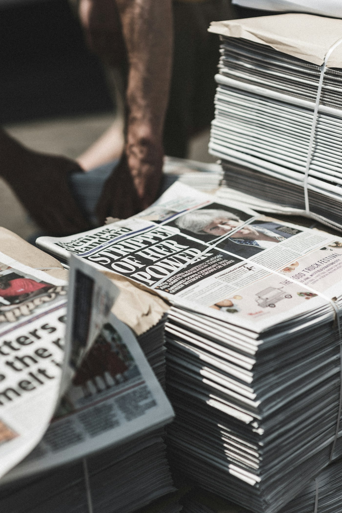 Stacks of printed newspapers